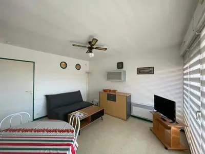 Télévision ou salle de divertissement dans l'établissement Appartement à Hossegor, à 30m de la plage avec piscine et parking souterrain - FR-1-413-135