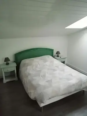 Un ou plusieurs lits dans un hébergement de l'établissement CHEZ MARTINE Appt climatisé 1 Chambre