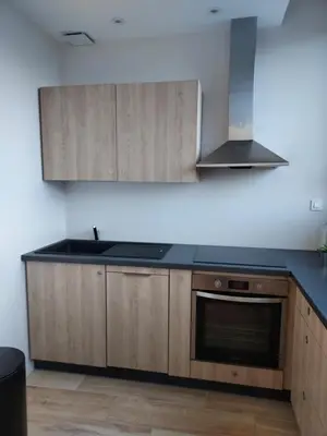 Cuisine ou kitchenette dans l'établissement Appartement Mimizan Plage accès direct plage surveillée