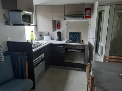 Cuisine ou kitchenette dans l'établissement Cordon LMP