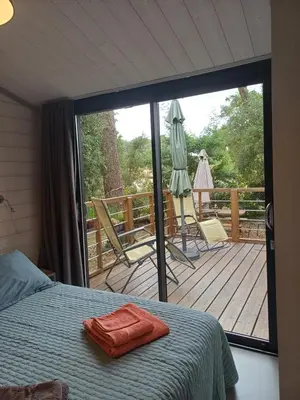 Un ou plusieurs lits dans un hébergement de l'établissement Chalet la lande