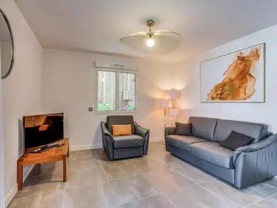 Coin salon dans l'établissement Apartment Domaine Aïga-2 by Interhome