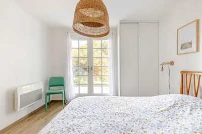 Un ou plusieurs lits dans un hébergement de l'établissement T3 Les Anémones à 50m de la plage avec grande terrasse et grand jardin