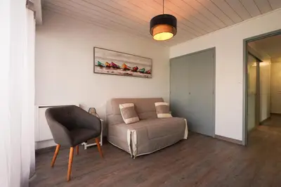 Coin salon dans l'établissement Superbe appart.55m2 - 200m Ocean et parking
