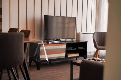 Télévision ou salle de divertissement dans l'établissement Superbe appart.55m2 - 200m Ocean et parking