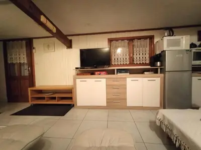 Cuisine ou kitchenette dans l'établissement Gîte chez Kaky