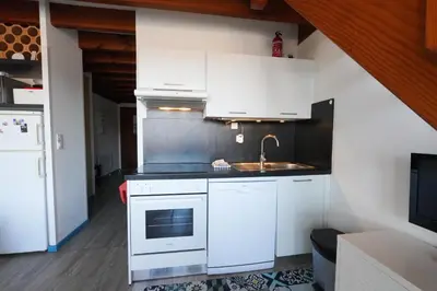 Cuisine ou kitchenette dans l'établissement Appartement en duplex 2* Résidence Les Pêcheurs