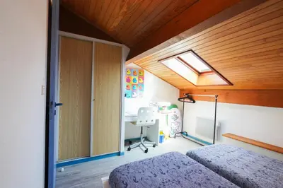 Un ou plusieurs lits dans un hébergement de l'établissement Appartement en duplex 2* Résidence Les Pêcheurs