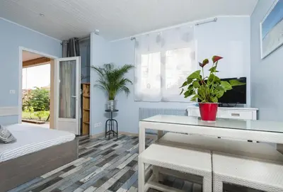 Un ou plusieurs lits dans un hébergement de l'établissement Le Studio de Noreda