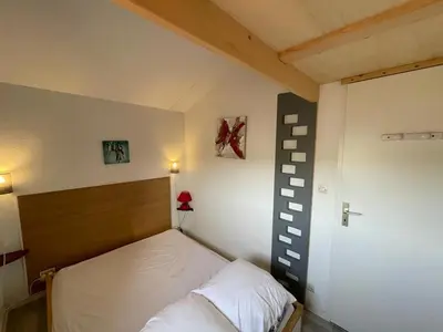 Un ou plusieurs lits dans un hébergement de l'établissement Villa Patio à 20m de la plage avec terrasse et parking - FR-1-413-159