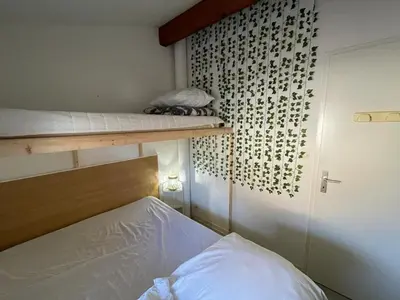 Un ou plusieurs lits dans un hébergement de l'établissement Villa Patio à 20m de la plage avec terrasse et parking - FR-1-413-159