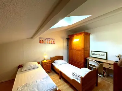 Un ou plusieurs lits dans un hébergement de l'établissement Appartement T2 mezzanine avec terrasse et animaux acceptés - FR-1-379-119