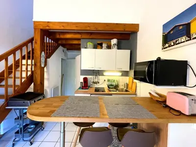 Cuisine ou kitchenette dans l'établissement Appartement T2 mezzanine avec terrasse et animaux acceptés - FR-1-379-119