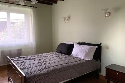 Un ou plusieurs lits dans un hébergement de l'établissement Gîte au coeur de la ferme