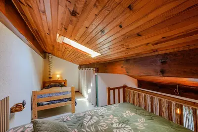 Un ou plusieurs lits dans un hébergement de l'établissement Maisonnette à 50m de la plage