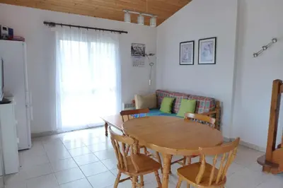 Coin salon dans l'établissement Réf 274, Seignosse océan, Villa Patio à 250m de la plage, avec place de parking et piscine commune , 6 personnes
