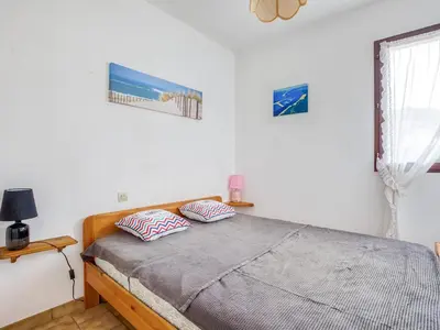 Un ou plusieurs lits dans un hébergement de l'établissement Maison T3 mezzanine, 6 pers, WiFi, près de l’océan, quartier résidentiel, Biscarrosse - FR-1-521-157