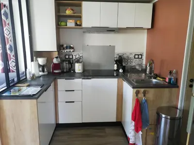 Cuisine ou kitchenette dans l'établissement MOBILHOME GASTES LANDES