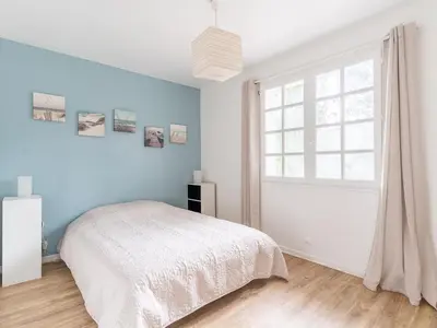Un ou plusieurs lits dans un hébergement de l'établissement Villa Calme entre Océan et Lac - 8 Pers - 4 Ch - Terrasse - BBQ - Jardin - Biscarrosse Plage - FR-1-319-418