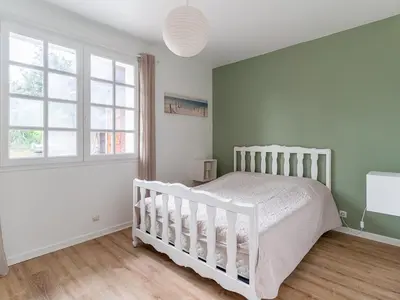 Un ou plusieurs lits dans un hébergement de l'établissement Villa Calme entre Océan et Lac - 8 Pers - 4 Ch - Terrasse - BBQ - Jardin - Biscarrosse Plage - FR-1-319-418