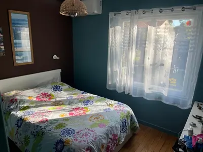 Un ou plusieurs lits dans un hébergement de l'établissement Grande Maison Familiale entre lac et océan