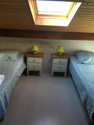 Un ou plusieurs lits dans un hébergement de l'établissement Villa OCELANDES