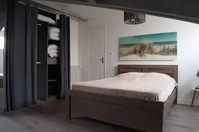 Un ou plusieurs lits dans un hébergement de l'établissement Villa Argentine Beach