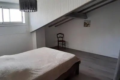 Un ou plusieurs lits dans un hébergement de l'établissement Villa Argentine Beach