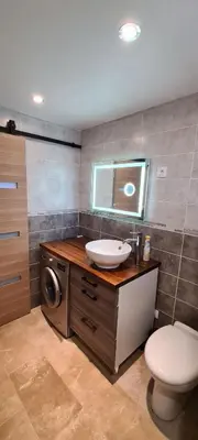 Salle de bains dans l'établissement Appartement Ychoux