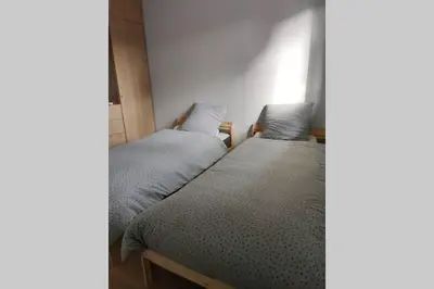 Un ou plusieurs lits dans un hébergement de l'établissement Agréable Villa Domaine du Golf Piscine CHAUFFEE