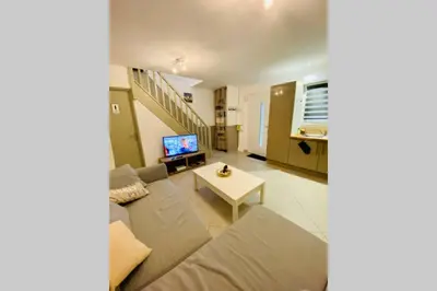 Télévision ou salle de divertissement dans l'établissement Les pignots Logement T2 Bassin Arcachon