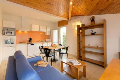 Cuisine ou kitchenette dans l'établissement Résidence Amaréna