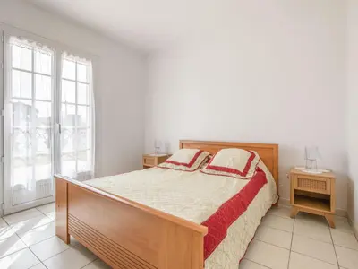 Un ou plusieurs lits dans un hébergement de l'établissement Holiday Home L'Albizia by Interhome