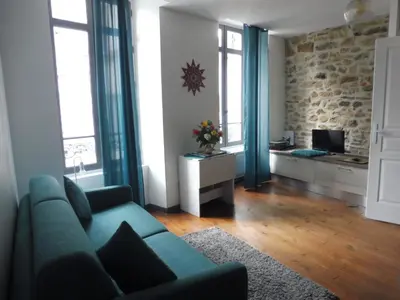 Coin salon dans l'établissement Studio de charme au centre ville