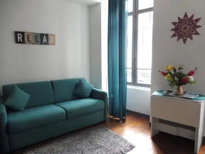 Coin salon dans l'établissement Studio de charme au centre ville