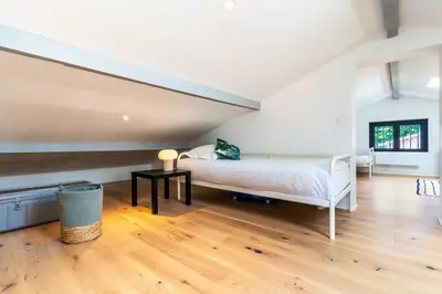 Un ou plusieurs lits dans un hébergement de l'établissement Villa confortable à Seignosse avec piscine privée