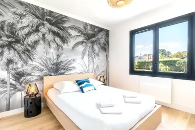 Un ou plusieurs lits dans un hébergement de l'établissement Villa confortable à Seignosse avec piscine privée