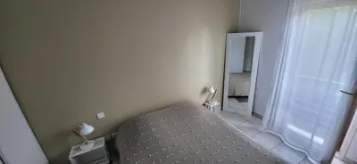 Un ou plusieurs lits dans un hébergement de l'établissement Appartement 2 chambres Balcon Parking privé Centre Village