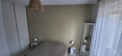 Un ou plusieurs lits dans un hébergement de l'établissement Appartement 2 chambres Balcon Parking privé Centre Village