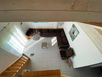 Coin salon dans l'établissement Ensemble de 3 villas avec piscine chauffée, esprit détente