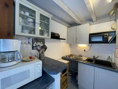 Cuisine ou kitchenette dans l'établissement Charmant T2 Mezzanine - Animaux admis - FR-1-379-131