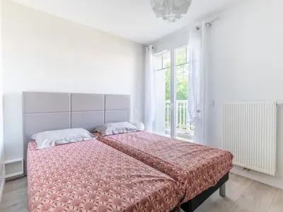 Un ou plusieurs lits dans un hébergement de l'établissement Apartment Les Portes de Pyla by Interhome