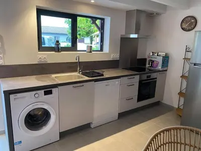 Cuisine ou kitchenette dans l'établissement Appartement du Centre