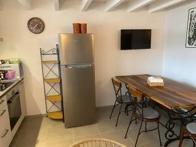 Cuisine ou kitchenette dans l'établissement Appartement du Centre