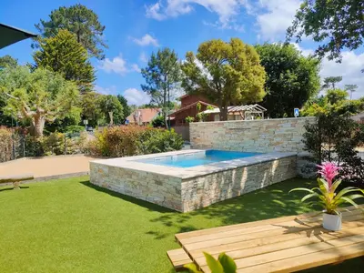 Piscine de l'établissement La VILLA OCEAN AVEC SPA et PISCINE - Les GITES DE CAMPARAN ou située à proximité
