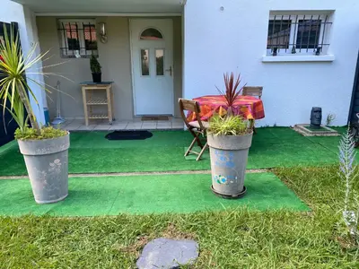 Jardin de l'établissement Appartement calme entre Côte Basque et Landes