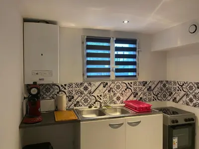 Cuisine ou kitchenette dans l'établissement Appartement calme entre Côte Basque et Landes