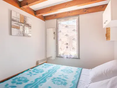 Un ou plusieurs lits dans un hébergement de l'établissement Maison T2 Mezzanine à 350m des Plages avec Terrasse et Parking à Biscarrosse - FR-1-521-182