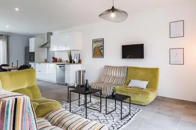 Coin salon dans l'établissement Le Capbreton