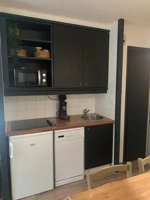 Cuisine ou kitchenette dans l'établissement Appartement du Golf Les Bastides piscine et océan